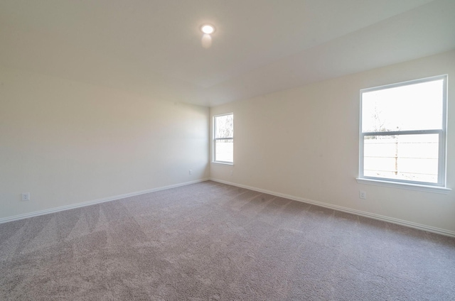 empty room featuring carpet flooring