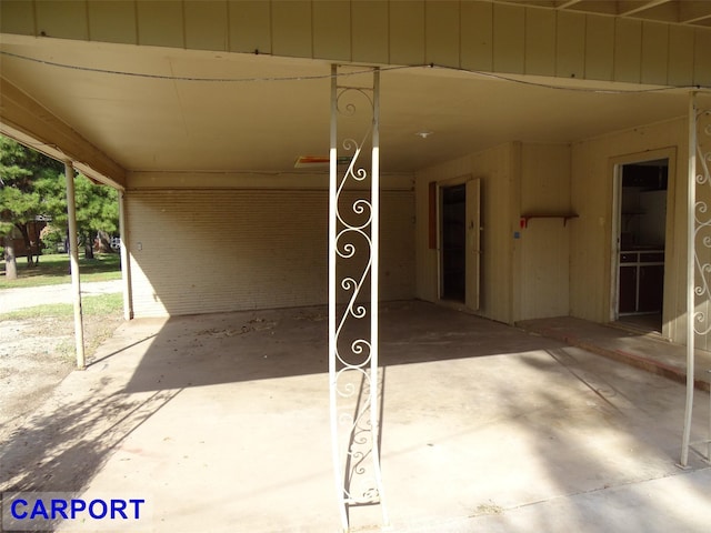 exterior space with a carport