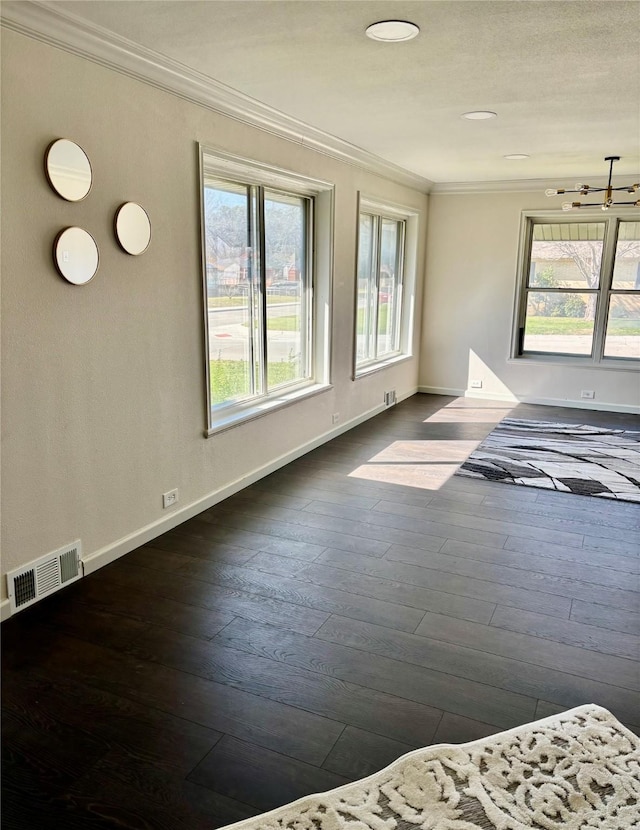 interior space with crown molding and dark hardwood / wood-style flooring