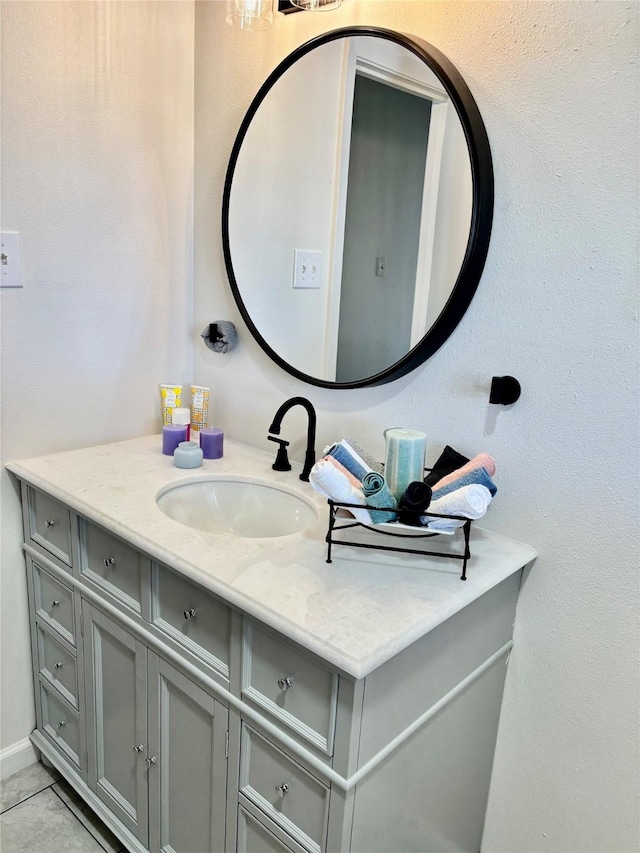 bathroom with vanity and tile patterned flooring