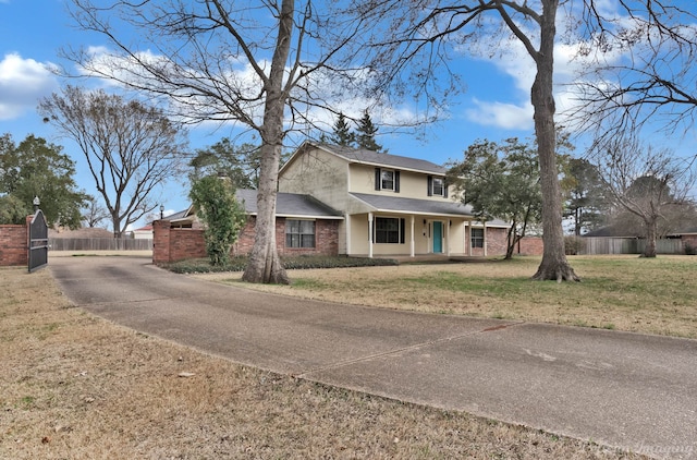 view of front of house with a front lawn