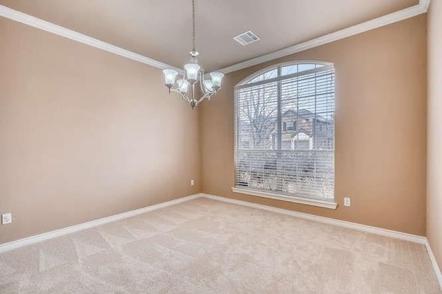 unfurnished room featuring carpet flooring, a notable chandelier, and ornamental molding