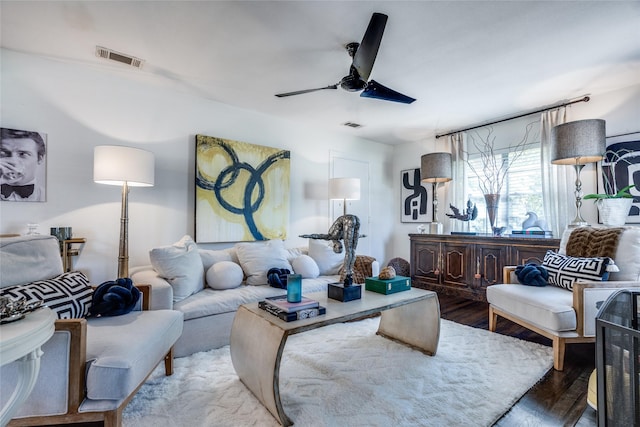 living room with hardwood / wood-style floors and ceiling fan