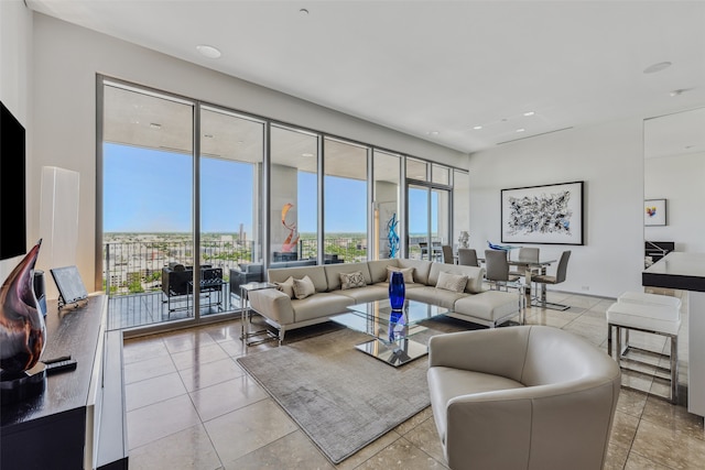 living room featuring light tile patterned floors and recessed lighting