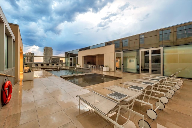 view of swimming pool with a patio