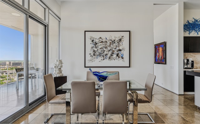 dining room with a wall of windows