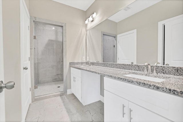 bathroom featuring vanity and walk in shower