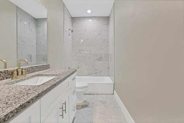 full bathroom featuring vanity, toilet, and tiled shower / bath