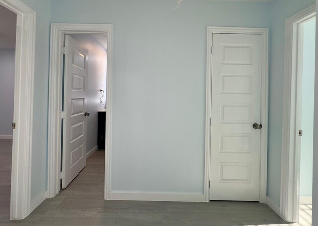 empty room with ceiling fan, dark hardwood / wood-style flooring, and lofted ceiling