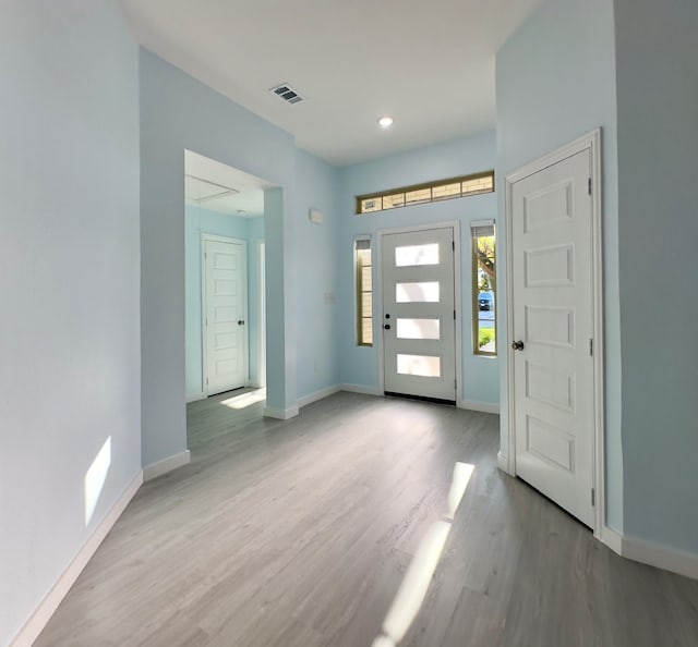 foyer with light hardwood / wood-style flooring