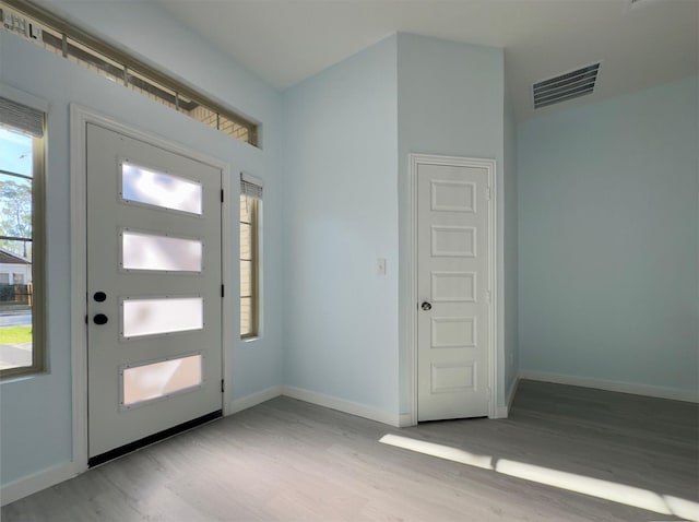 foyer entrance featuring light hardwood / wood-style floors