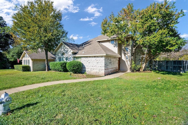 view of front of home featuring a front lawn