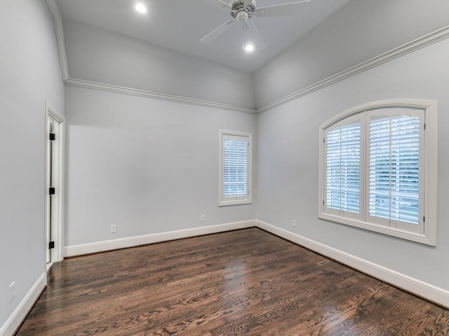 unfurnished room featuring dark hardwood / wood-style flooring, crown molding, ceiling fan, and a healthy amount of sunlight