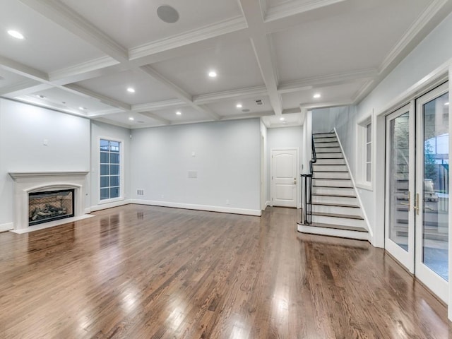 unfurnished living room featuring beam ceiling, hardwood / wood-style floors, and coffered ceiling