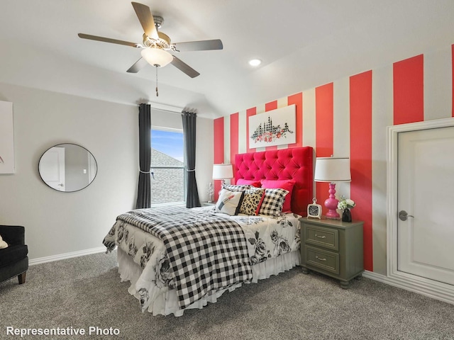 carpeted bedroom featuring vaulted ceiling and ceiling fan