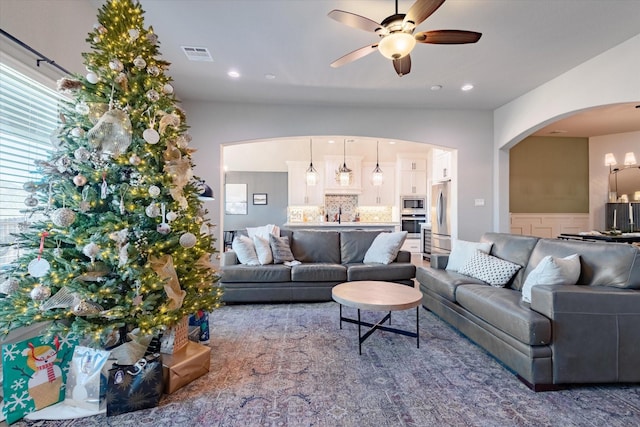 living room with ceiling fan