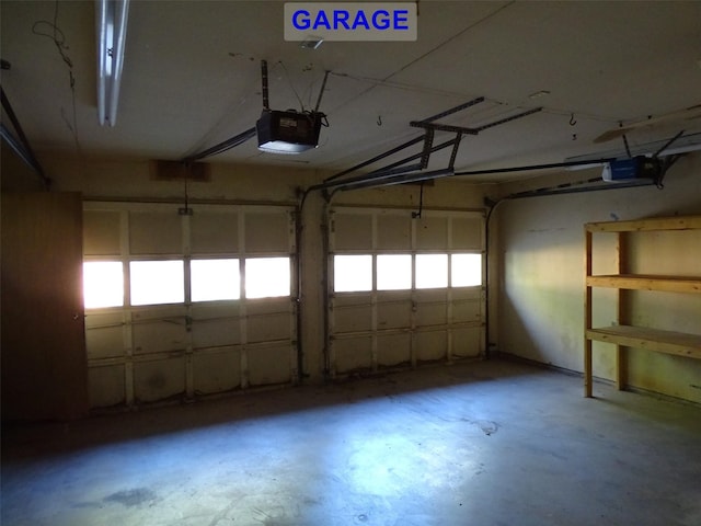 garage featuring a garage door opener