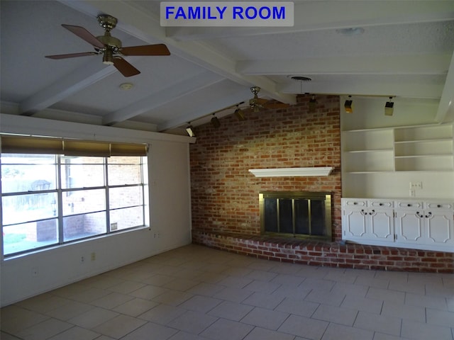 unfurnished living room featuring tile patterned flooring, lofted ceiling with beams, ceiling fan, and a fireplace