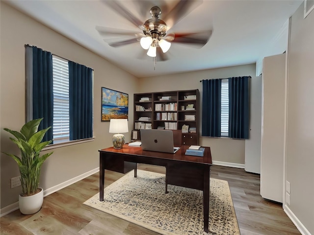 office area featuring ceiling fan and hardwood / wood-style floors