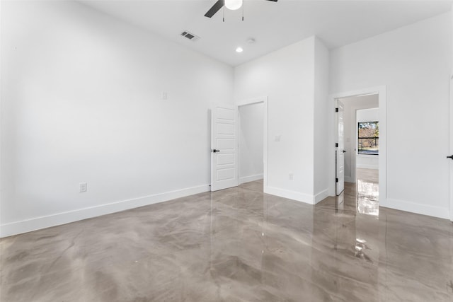 unfurnished bedroom featuring ceiling fan and concrete flooring