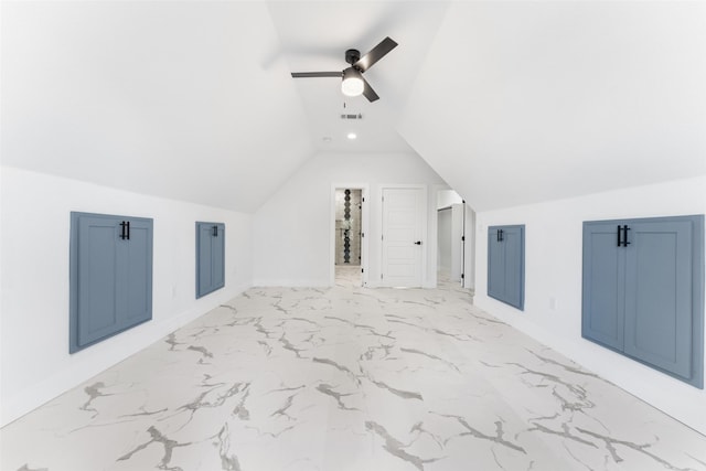 bonus room with ceiling fan and lofted ceiling