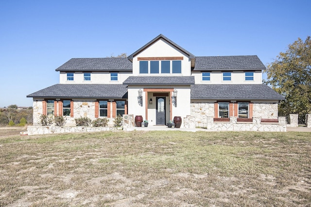 view of front facade featuring a front yard