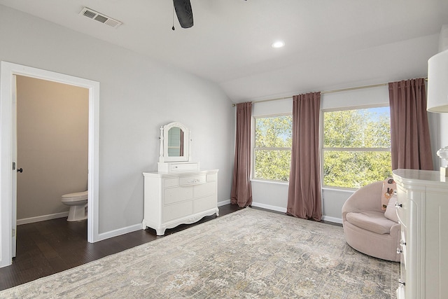 living area with ceiling fan, dark hardwood / wood-style flooring, and lofted ceiling