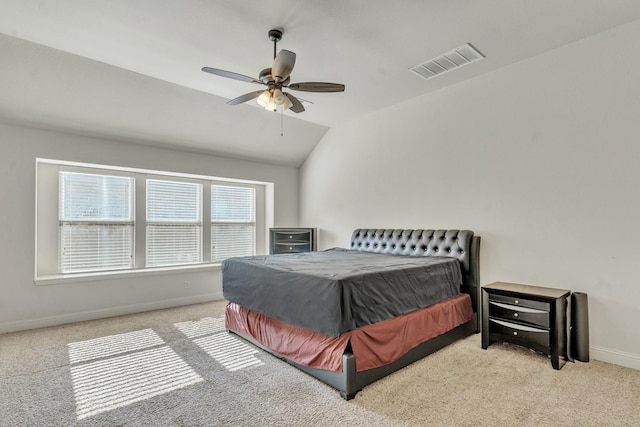 carpeted bedroom featuring ceiling fan and lofted ceiling