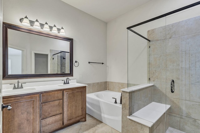 bathroom featuring vanity, tile patterned flooring, and plus walk in shower