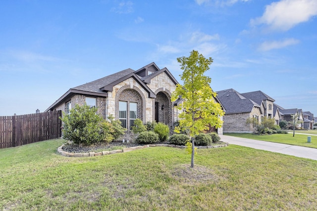 view of front of property with a front lawn