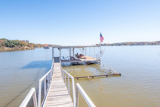 view of dock with a water view