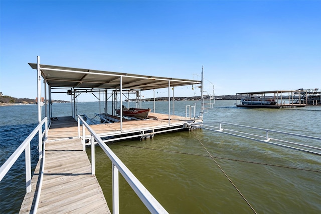 view of dock featuring a water view