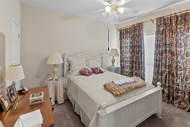 bedroom with multiple windows, carpet floors, and ceiling fan