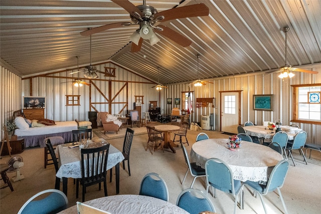 dining room with lofted ceiling