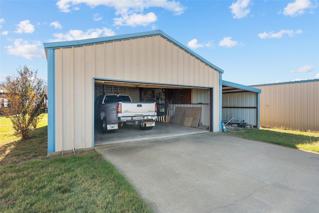 garage featuring a yard