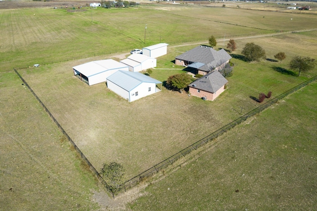 birds eye view of property featuring a rural view