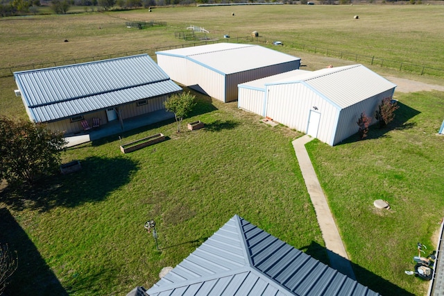 birds eye view of property featuring a rural view