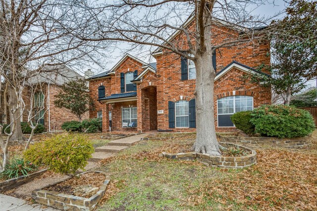 view of front property with a front lawn