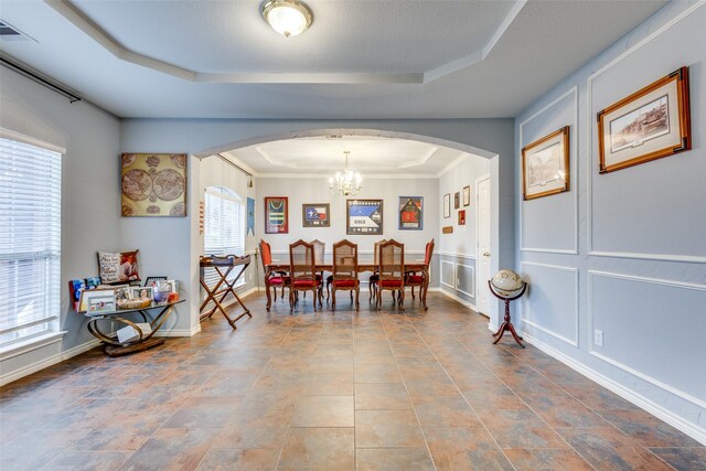 dining space with dark hardwood / wood-style flooring and an inviting chandelier