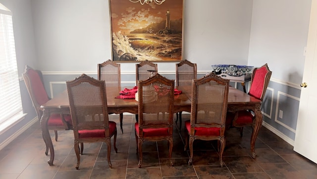 dining space featuring a chandelier