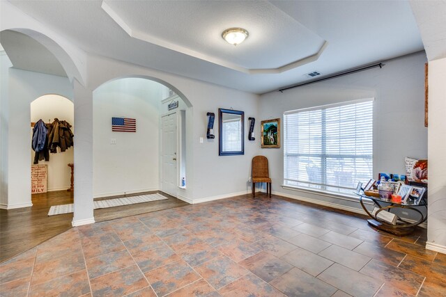 stairway with ceiling fan, wood-type flooring, and french doors