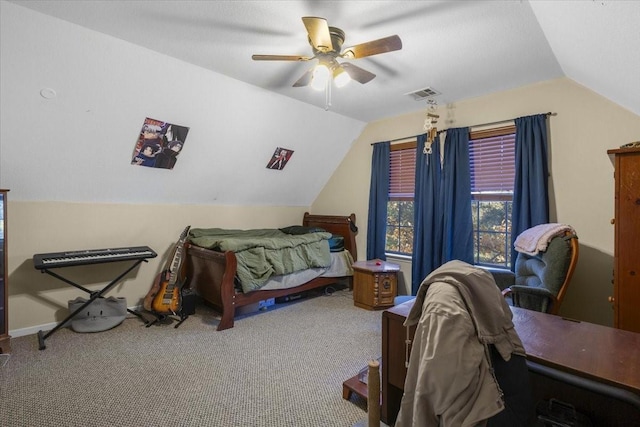 carpeted bedroom with ceiling fan and lofted ceiling