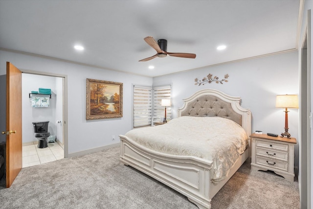 carpeted bedroom with ceiling fan, ensuite bath, tile patterned flooring, and recessed lighting