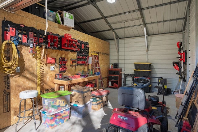 garage with a workshop area