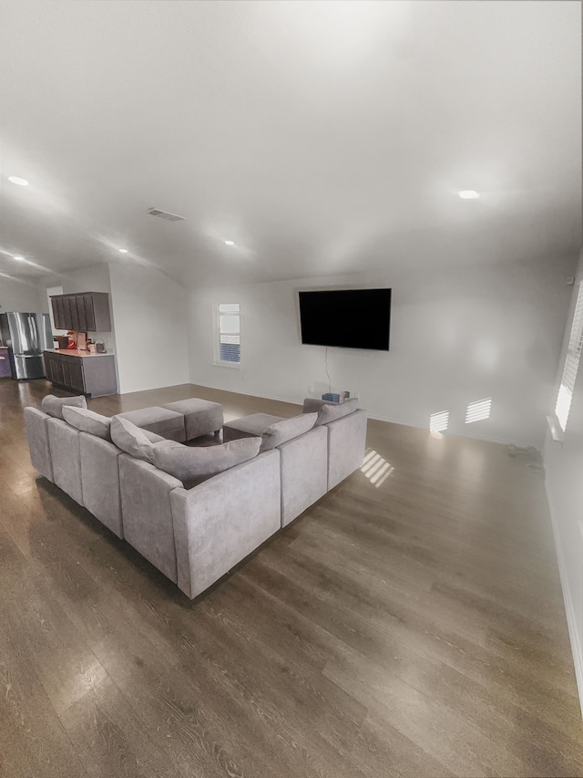 living room with dark hardwood / wood-style floors