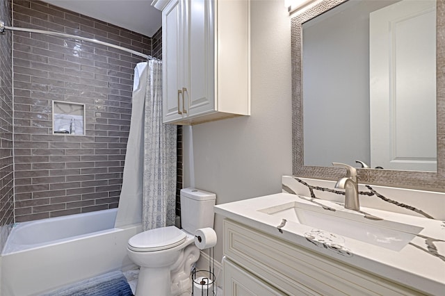 full bathroom featuring shower / tub combo with curtain, vanity, and toilet