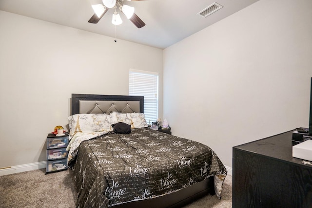 bedroom with ceiling fan and carpet