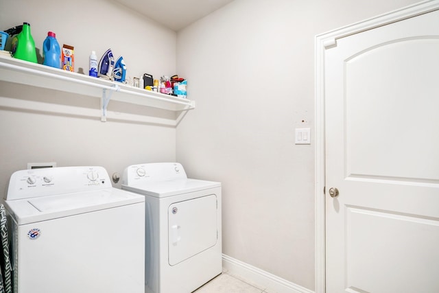 laundry area featuring washing machine and clothes dryer