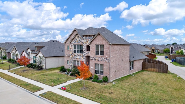 view of front of house featuring a front lawn