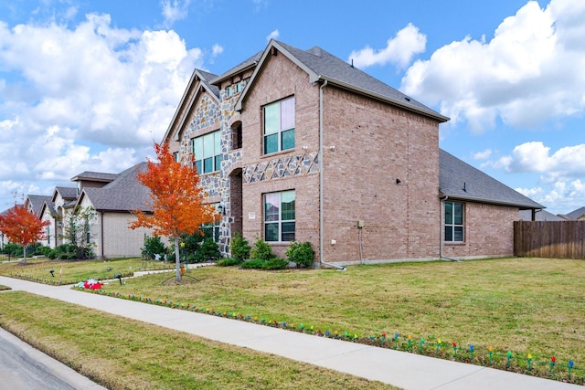 view of home's exterior featuring a yard